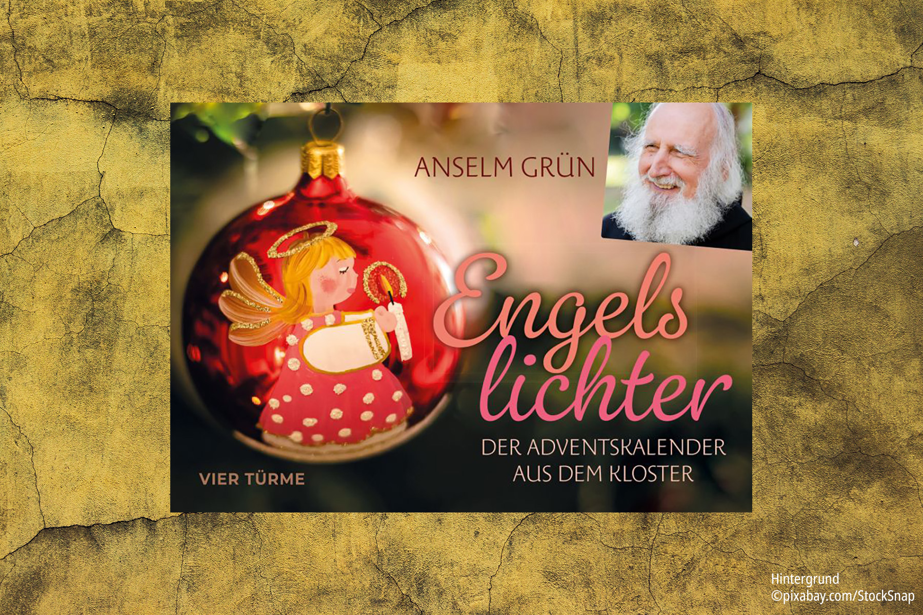 Buch "Engelslichter" vor gelben Wand mit vielen Rissen
